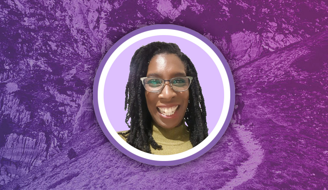 oenca-fontaine Oenca Fontaine, founder of the Online Leadership Academy, smiling in a circular portrait on a purple background